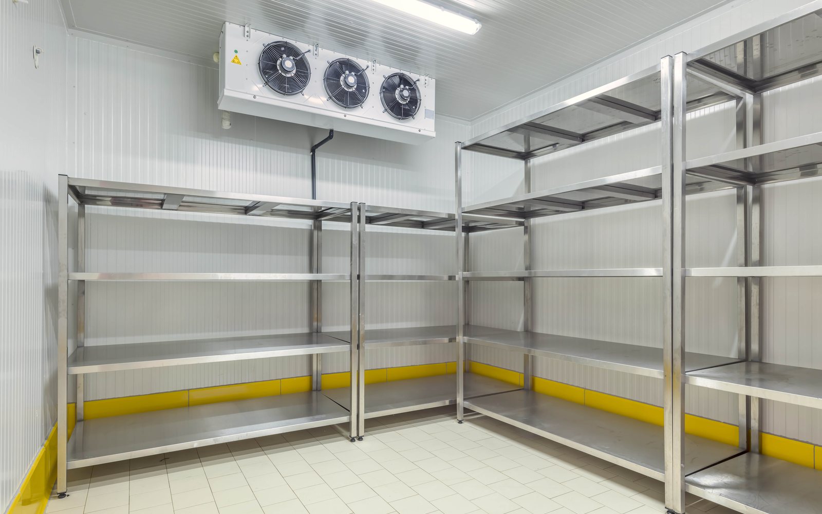 Quick freezer room with shelving, insulated panels, and ceiling unit cooler