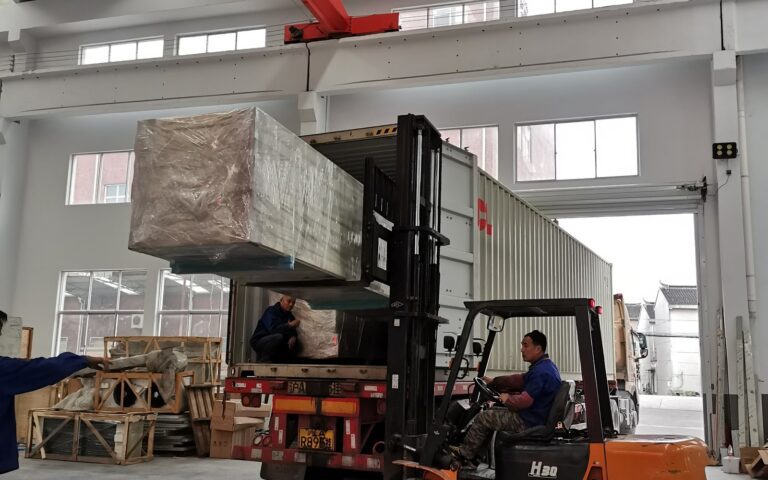 Forklift loading insulated cold room panels for a modular cold storage project